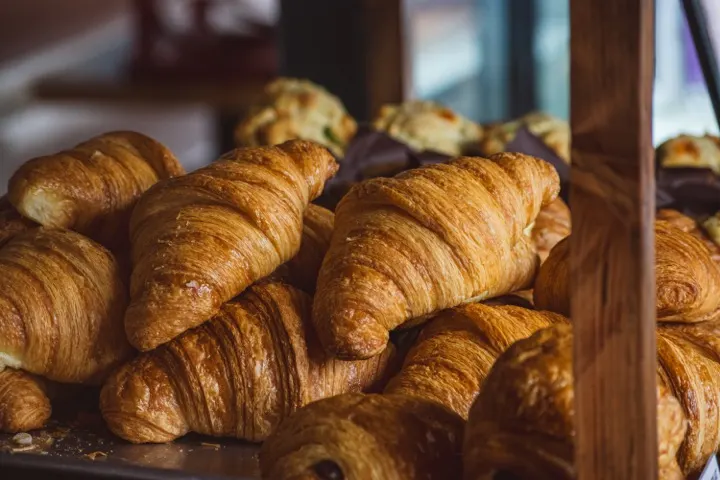 Fresh golden croissants on display